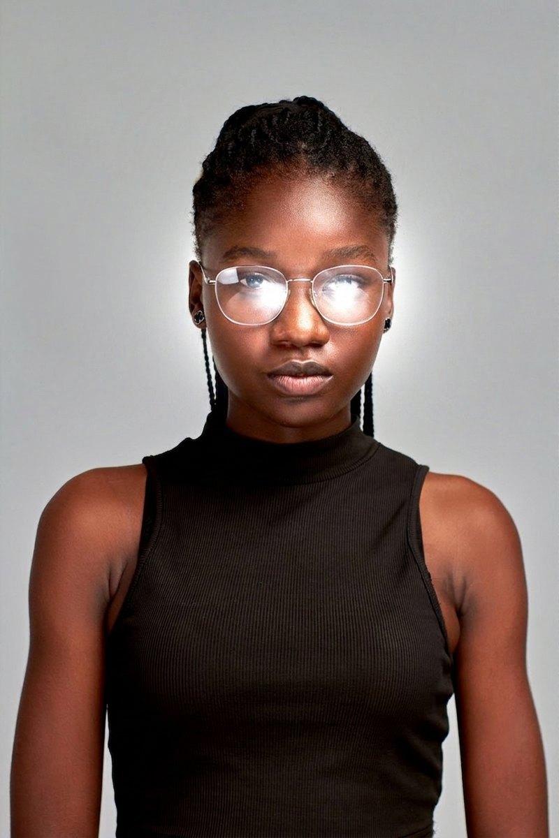Passport photo example with glare on eyeglasses