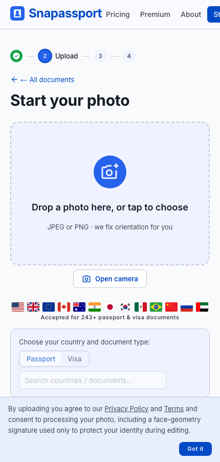 Screenshot of the Snapassport upload page with the Open camera button